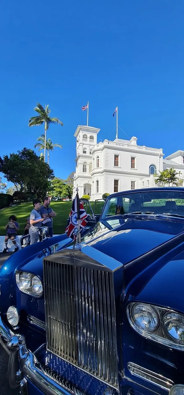 Government House in Queensland with a ceremonial vehicle in the foreground