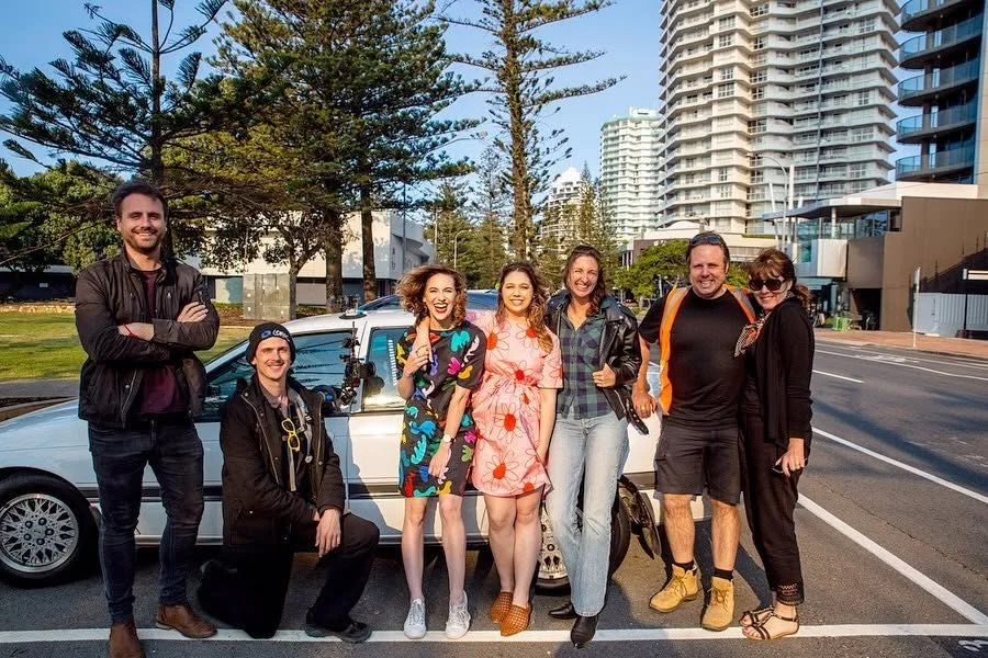Cast and production team with the car and camera equipment after filming in Coolangatta